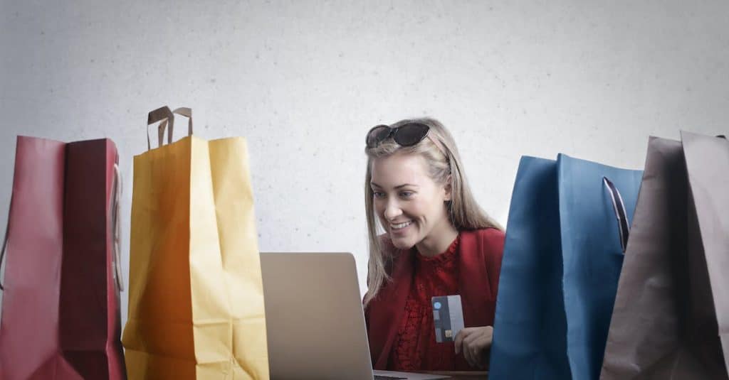 happy-woman-shopping-online-at-home